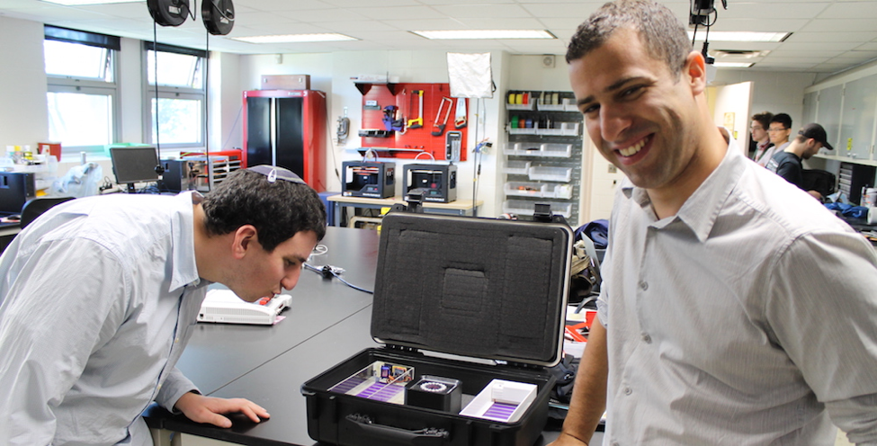 sammy-kupfer-an-early-intern-left-and-will-mcleod-posing-with-some-early-prototypes-at-the-zahn-center