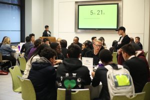 Image of roundtables conducted at the 2018 Entrepreneurs Festival, with the timer in the background reading 5 minutes 21 seconds remaining.