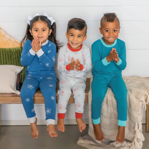 three children wearing lark adventurewear pants and shirts