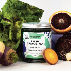 jar of spirulina with veggies and fruits