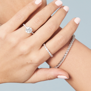 Hand and wrist with diamond jewelry.