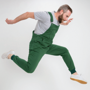 photo of man jumping wearing swoveralls